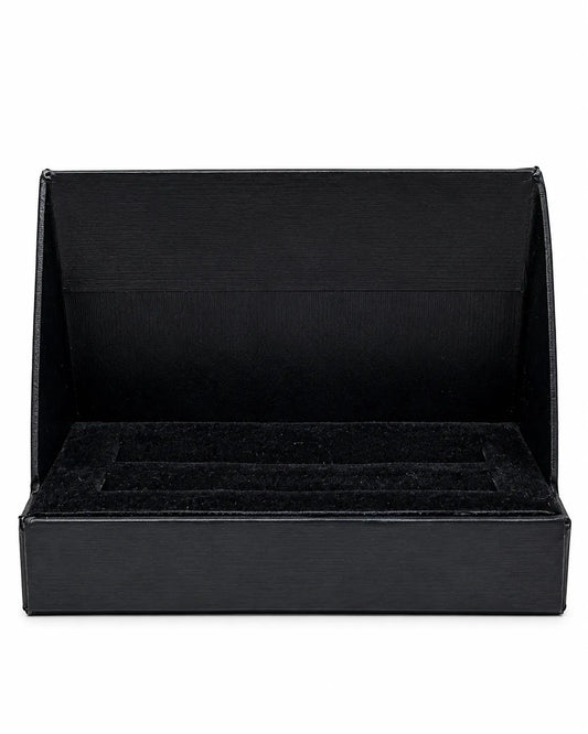 Mini fragrance discovery collection featuring black spray-capped tester vials with inspired-by perfume labels inside a black display box.